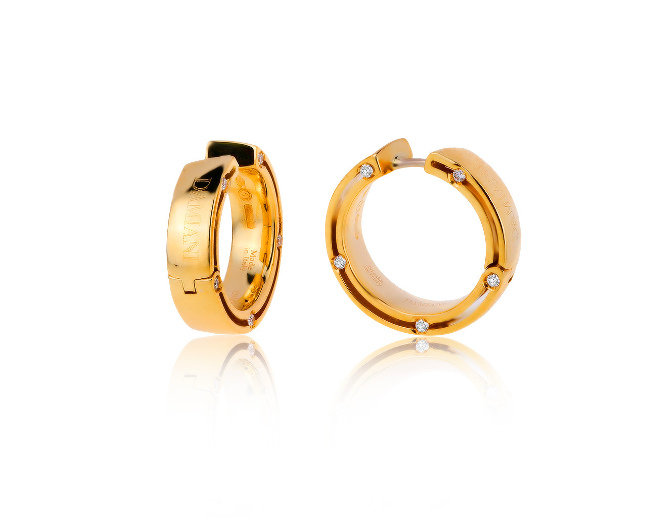 Оригинальные золотые серьги с бриллиантами 0.16ct Damiani