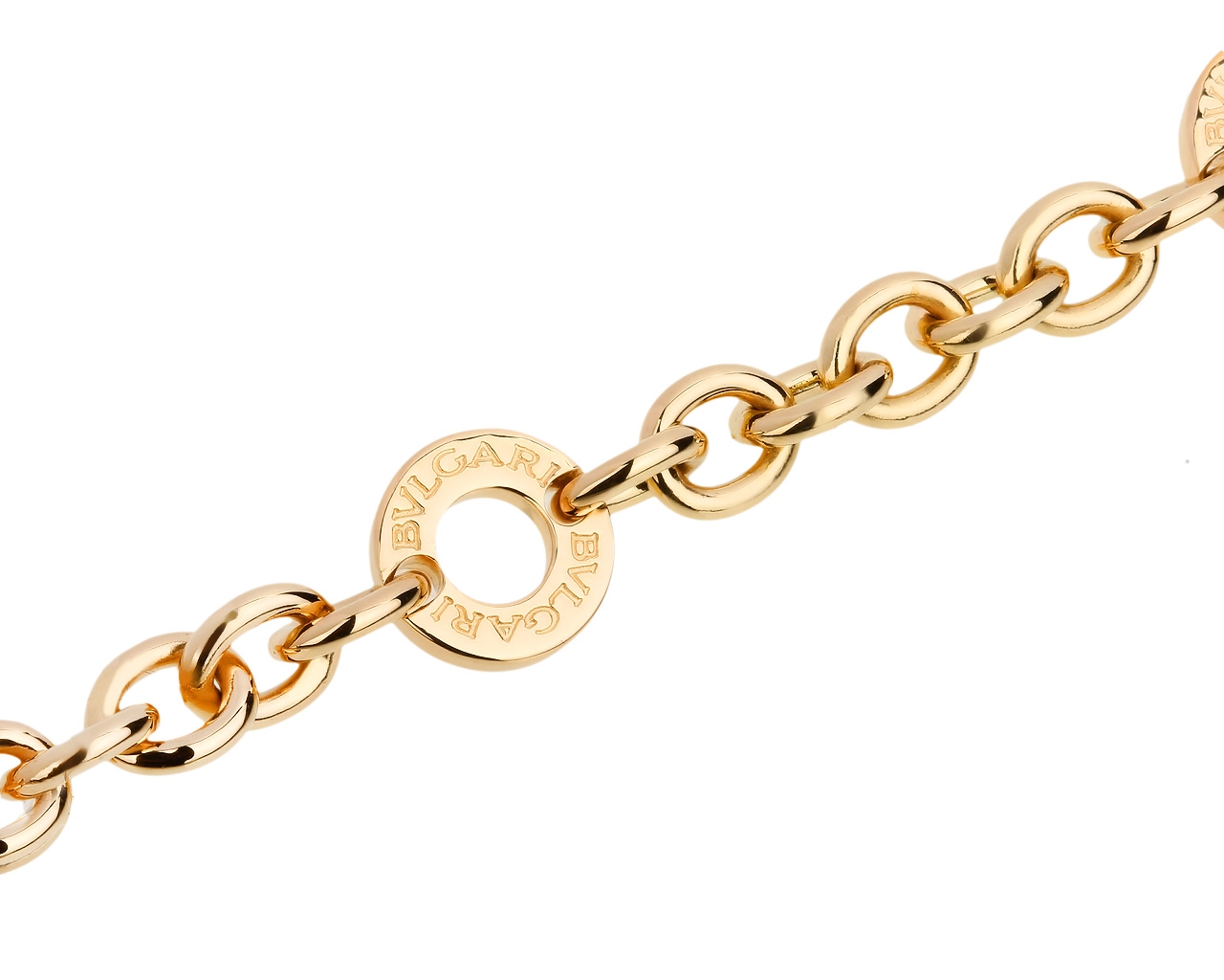 Интересный золотой браслет с шармами Bvlgari