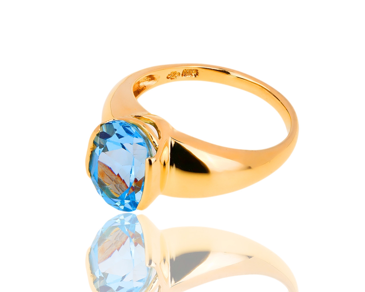 Привлекательное золотое кольцо с топазом