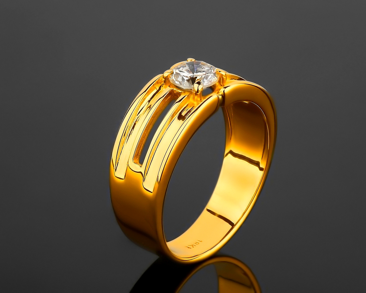 Золотое кольцо с бриллиантом 0.72ct