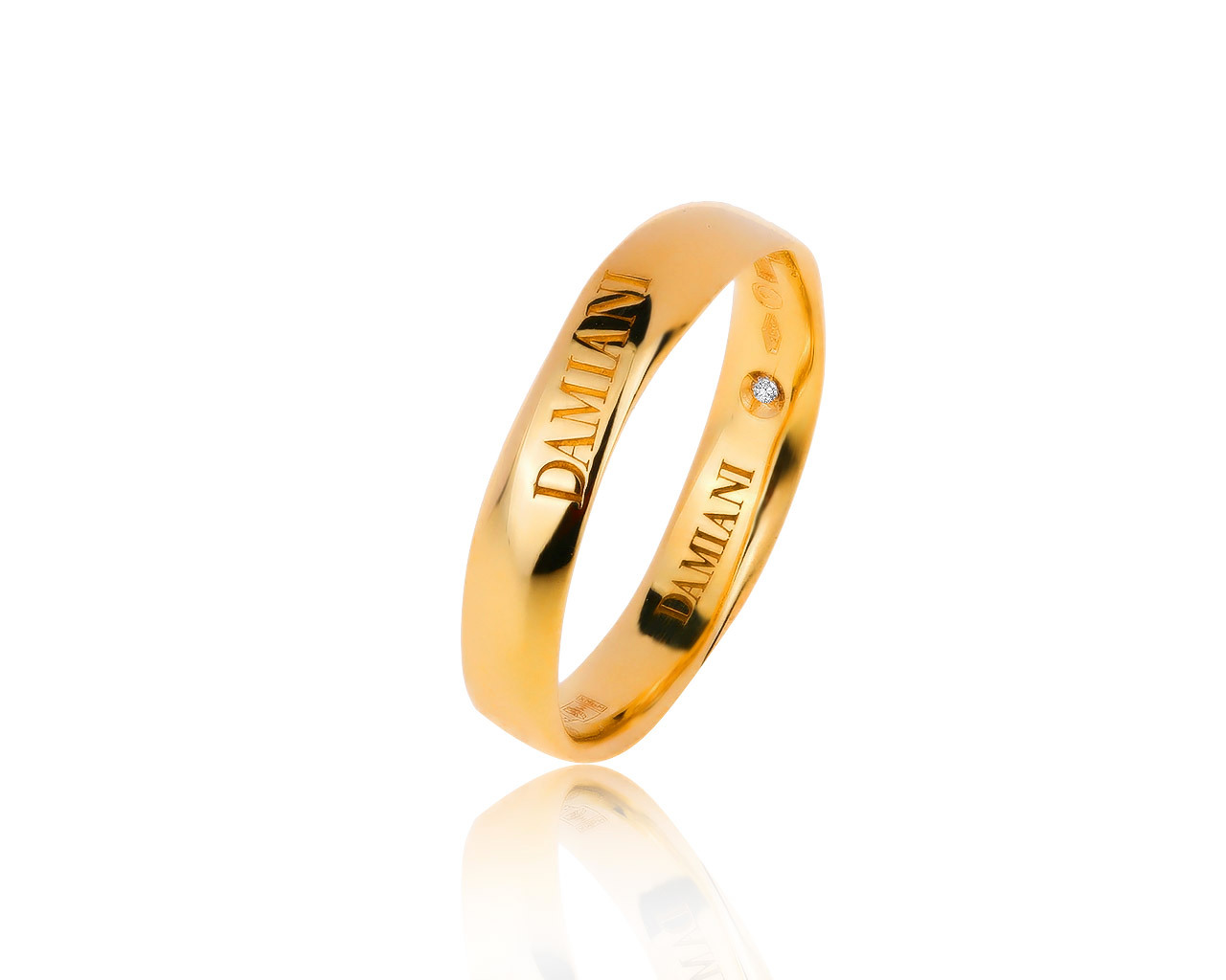 Оригинальное золотое кольцо с бриллиантом 0.05ct Damiani