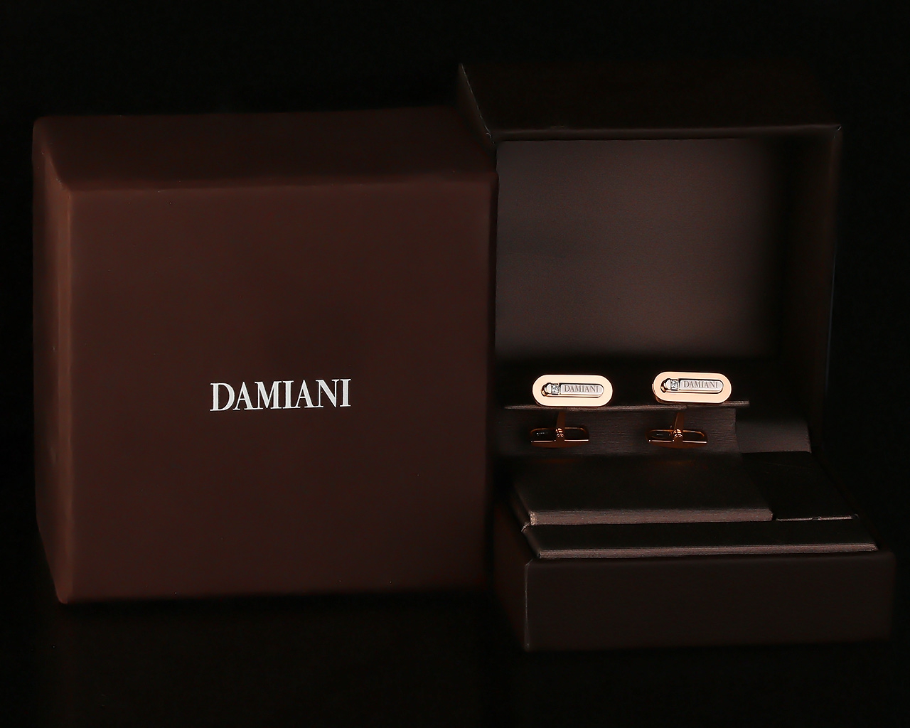 Оригинальные золотые запонки Damiani