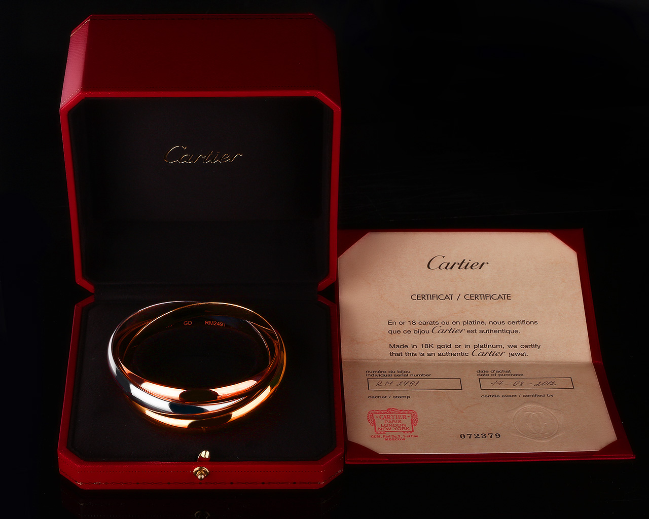 Первоклассный золотой браслет Trinity de Cartier