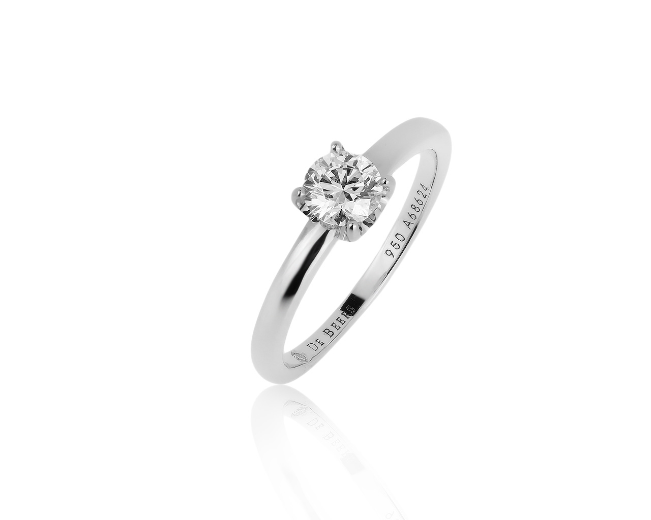Оригинальное платиновое кольцо с бриллиантом 0.60ct De Beers