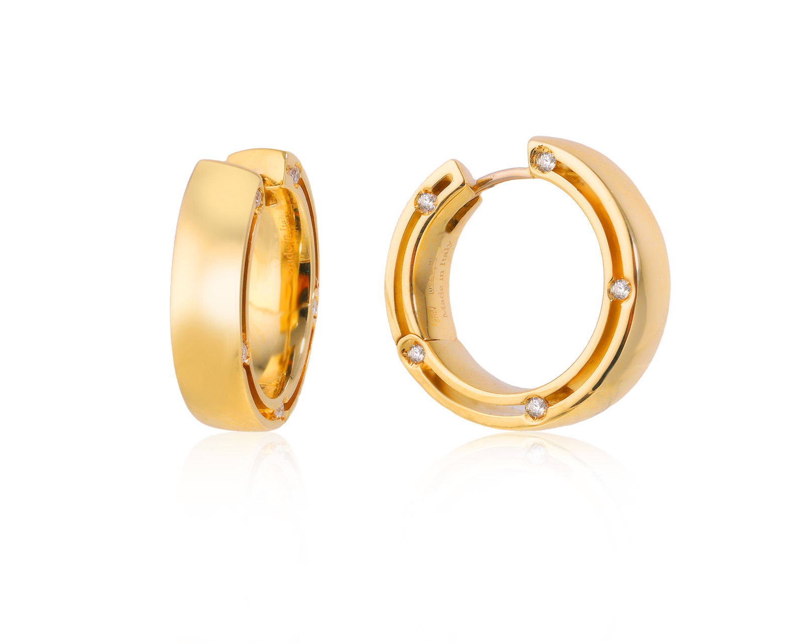 Оригинальные золотые серьги Damiani D.Side Brad Pitt