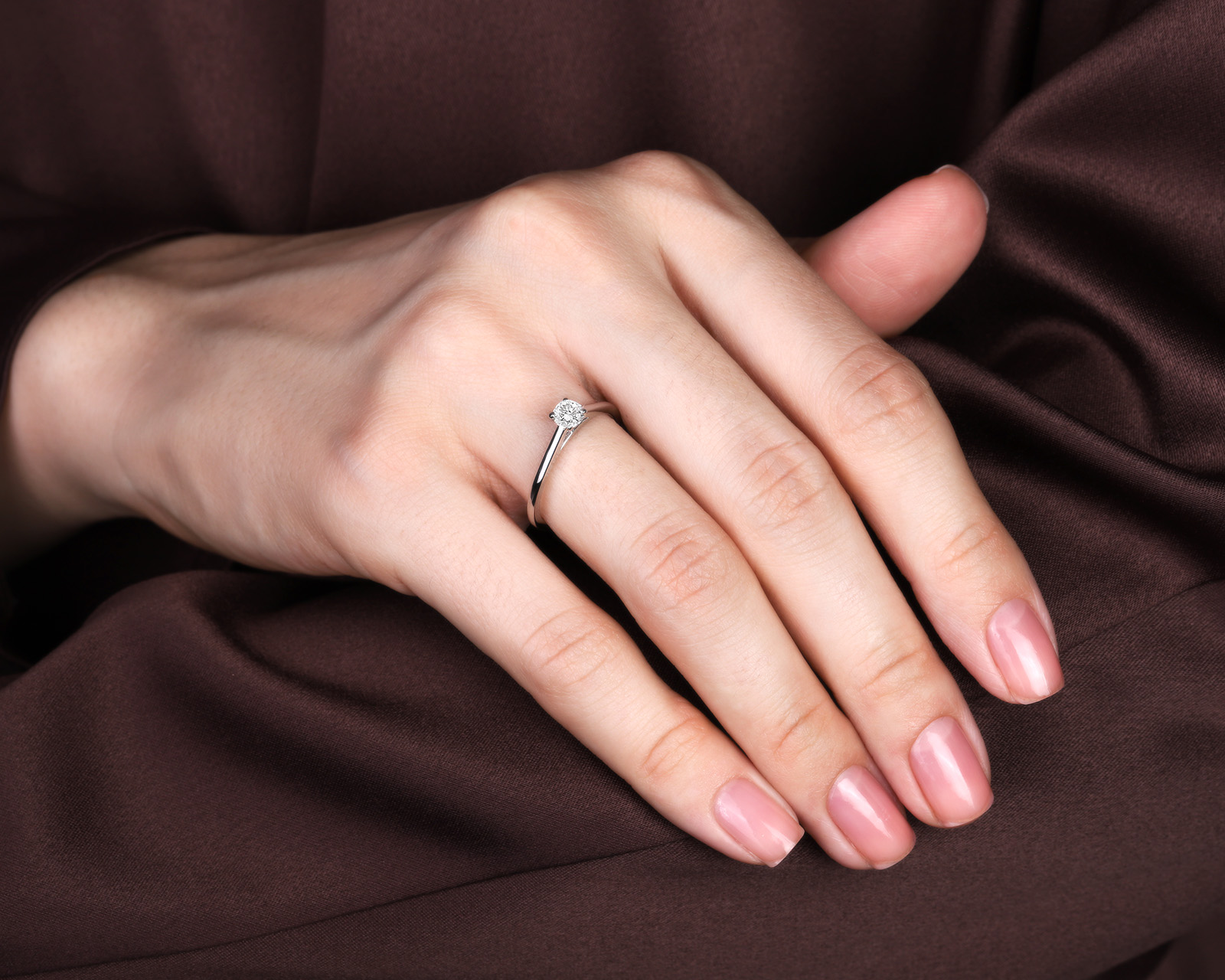 Оригинальное платиновое кольцо с бриллиантом 0.33ct De Beers