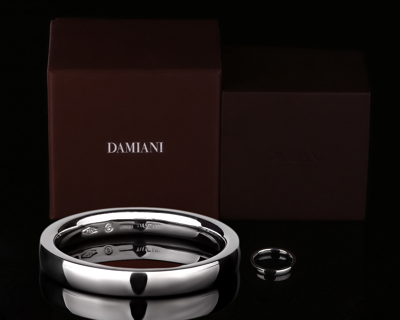 Стильное золотое кольцо Damiani