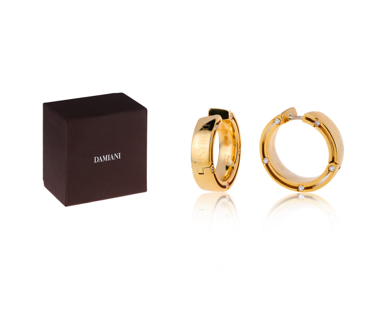 Оригинальные золотые серьги с бриллиантами 0.16ct Damiani