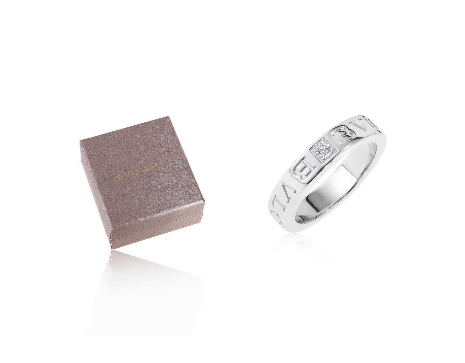 Оригинальное золотое кольцо с бриллиантом 0.04ct Bvlgari