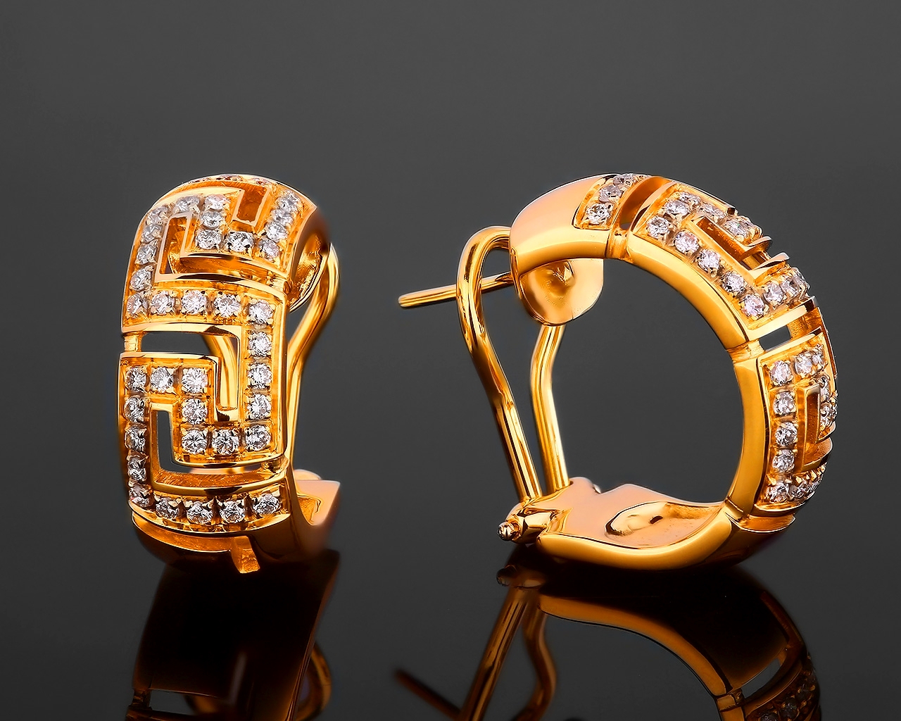 Золотые серьги с бриллиантами 0.80ct Versace