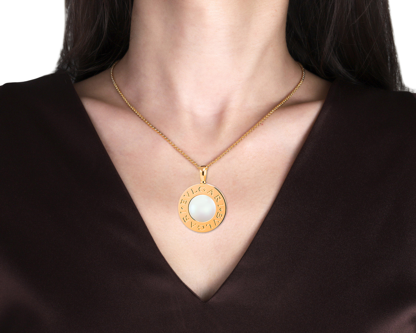 Оригинальный золотой кулон с перламутром и ониксом Bvlgari Bvlgari Reversible
