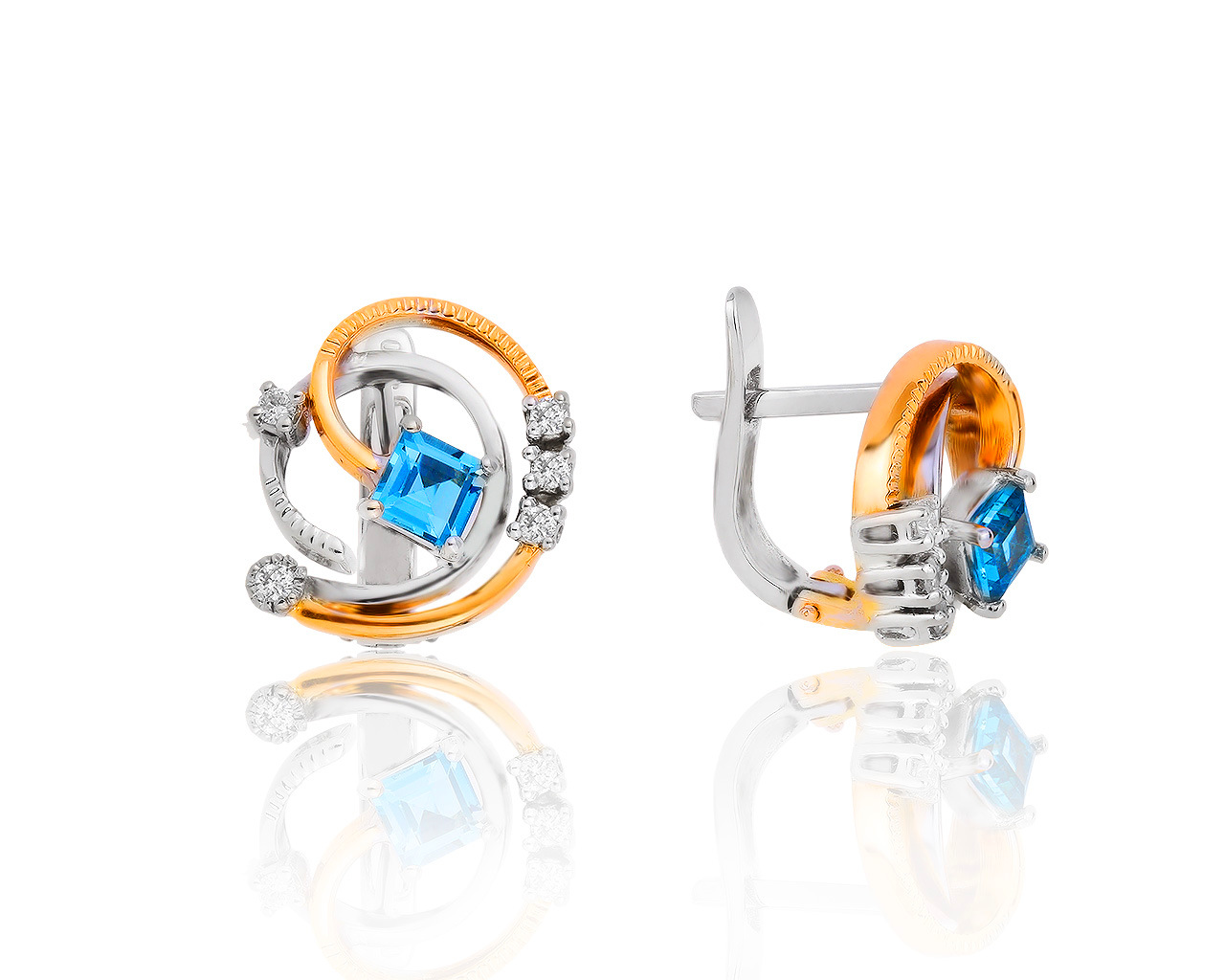 Превосходные золотые серьги с топазами 0.50ct