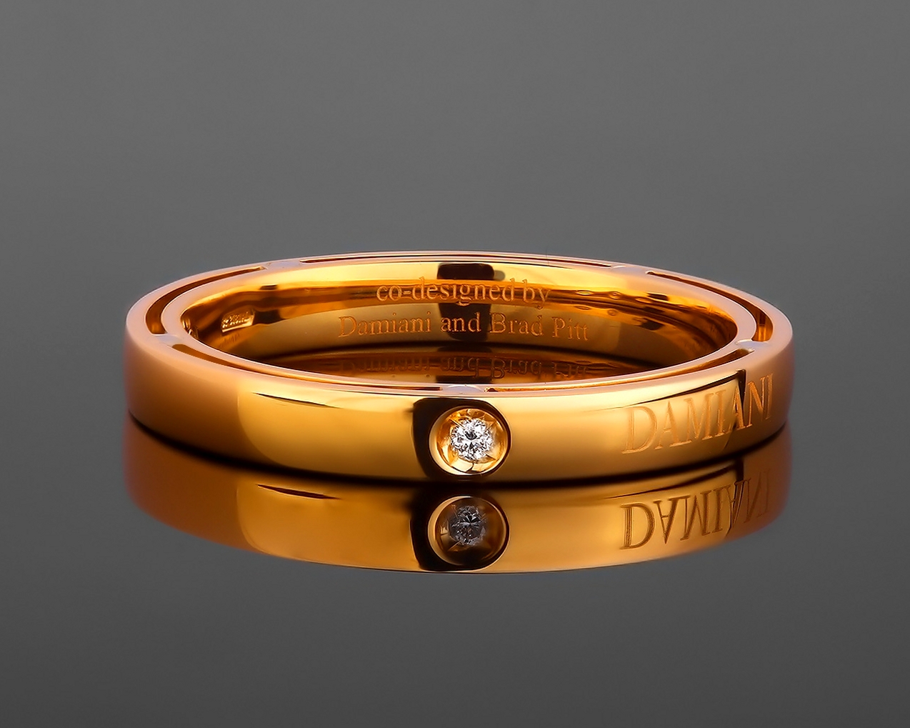 Золотое кольцо с бриллиантом Damiani Brad Pitt