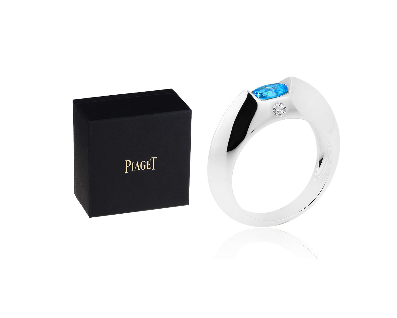 Золотое кольцо с бриллиантом и топазом Piaget