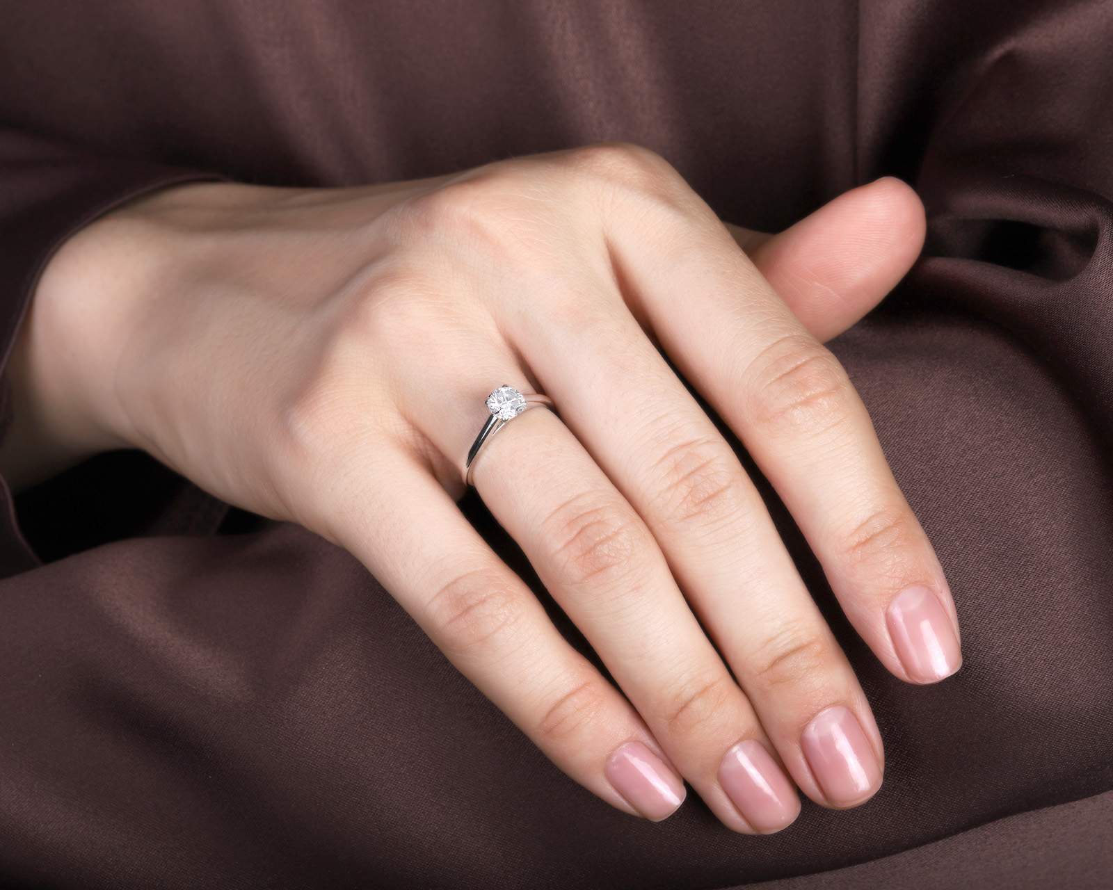 Оригинальное платиновое кольцо с бриллиантом 0.52ct De Beers