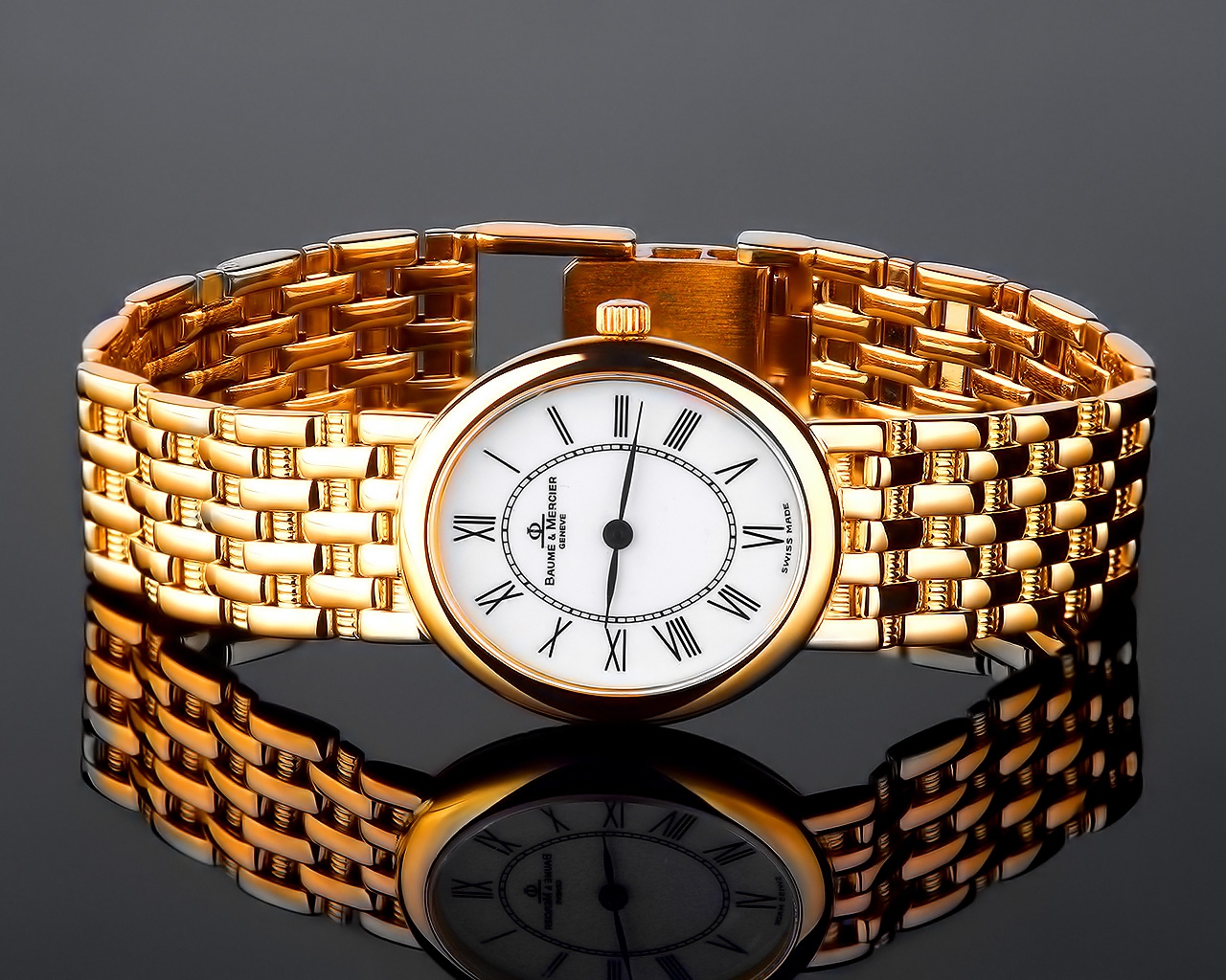 Стильные золотые часы Baume&Mercier