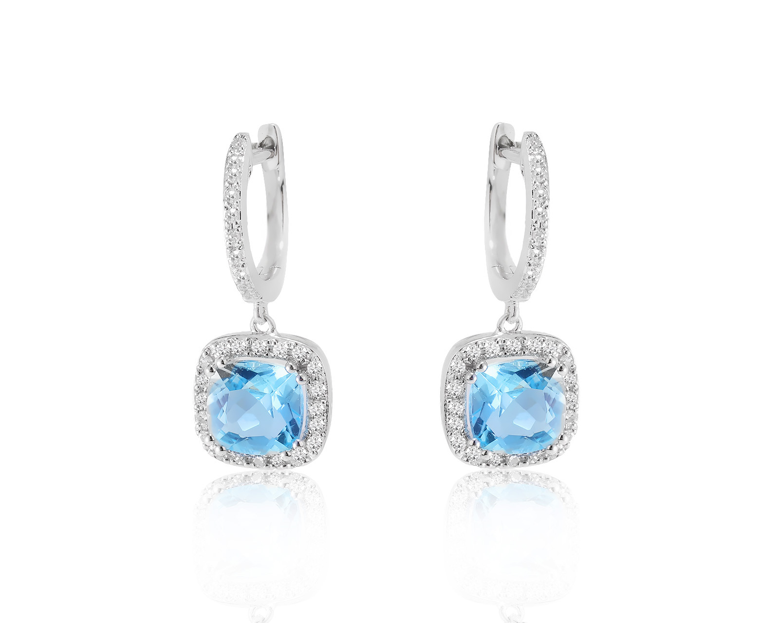 Эстетичные золотые серьги с топазами 2.20ct
