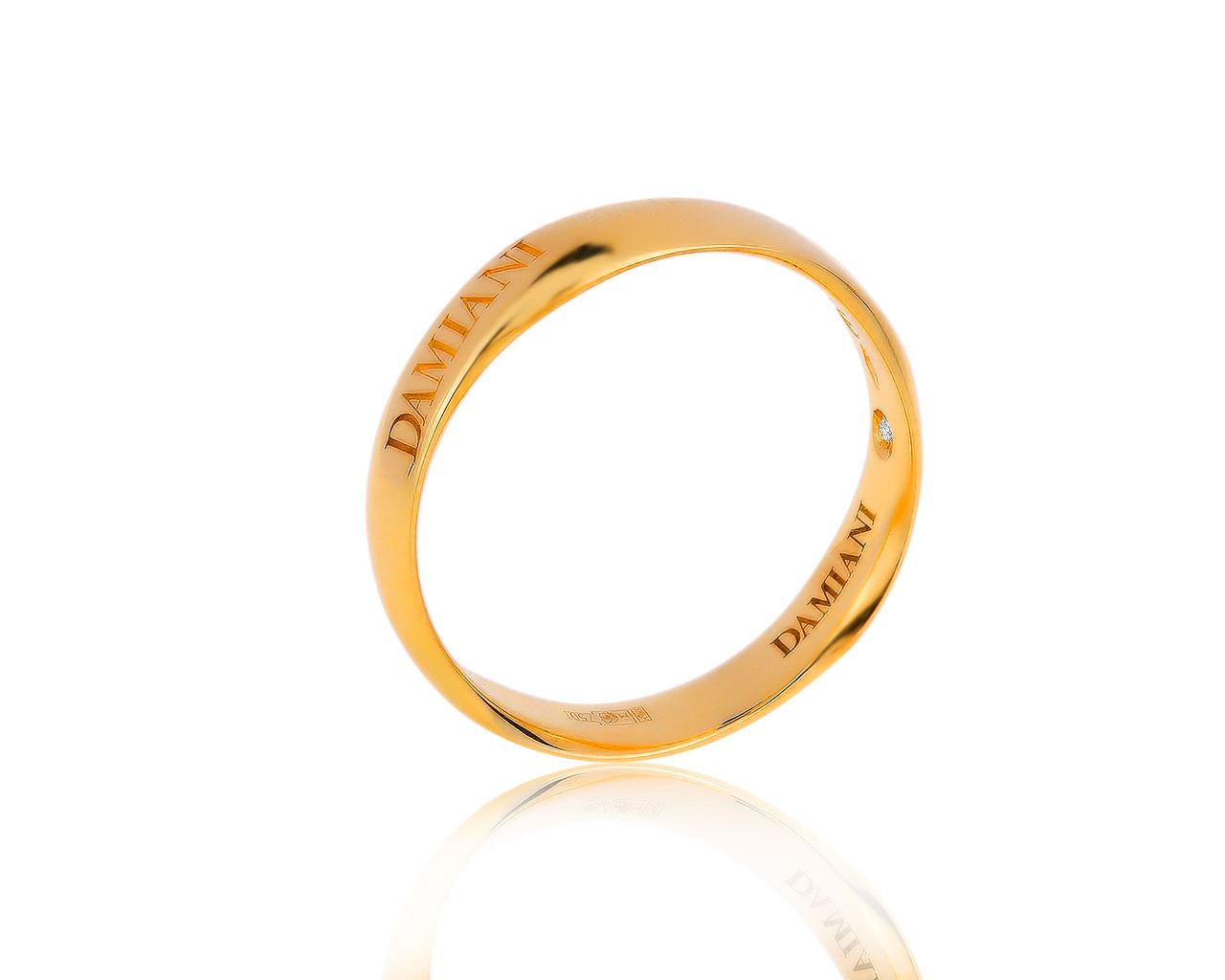 Оригинальное золотое кольцо с бриллиантом 0.05ct Damiani