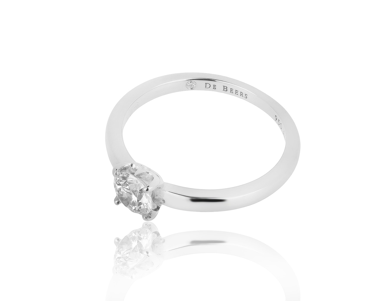 Оригинальное платиновое кольцо с бриллиантом 0.60ct De Beers