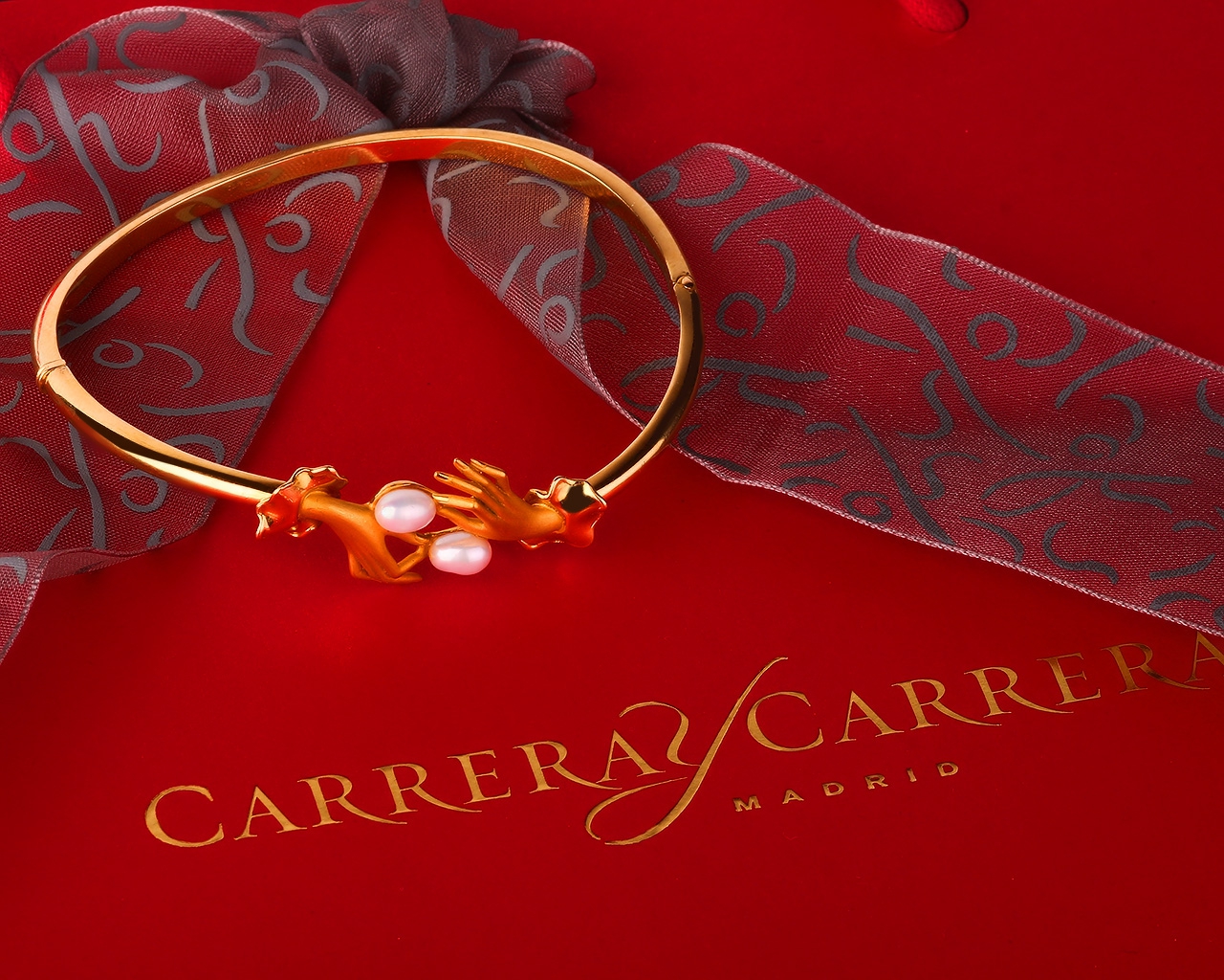 Изысканный золотой браслет Carrera&Carrera