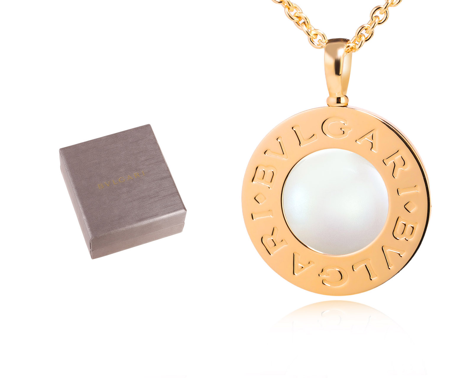 Оригинальный золотой кулон с перламутром и ониксом Bvlgari Bvlgari Reversible